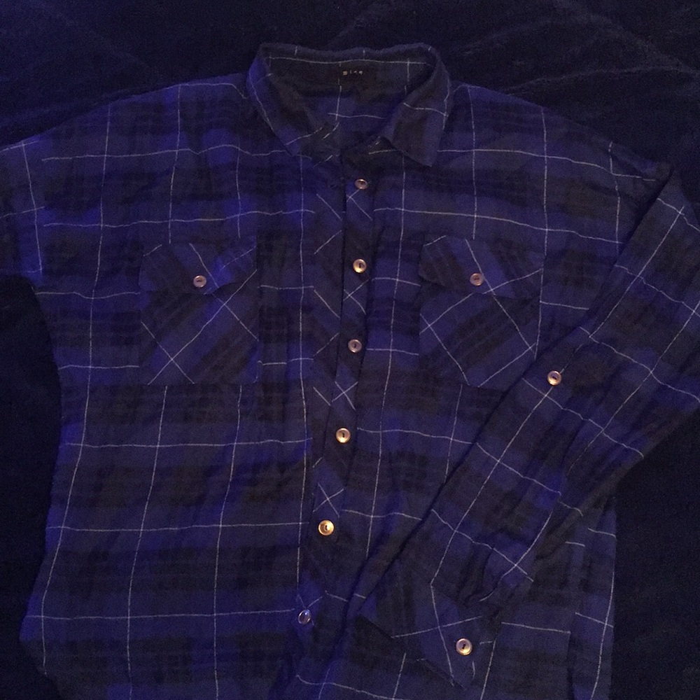 Long sleeved blue/black flannel shirt.